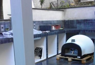 Struttura in ferro e vetro con cucina esterna zona Camilluccia, Roma